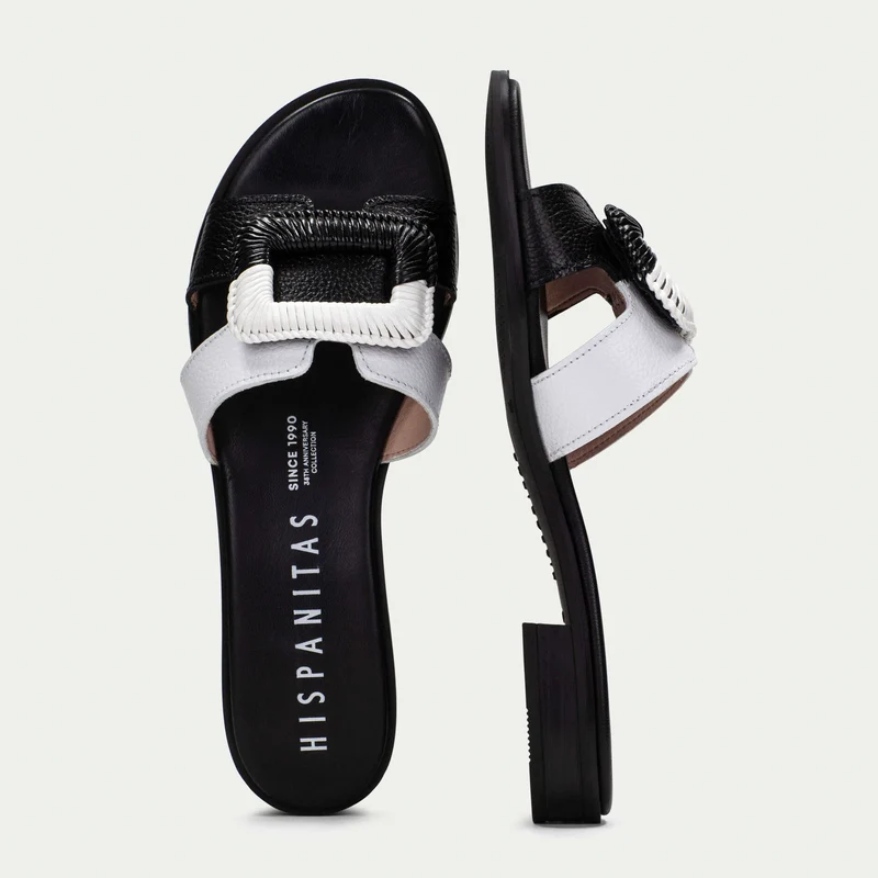 Hispanitas – Sandalias Planas Yakarta en Cuero Bicolor Blanco y Negro